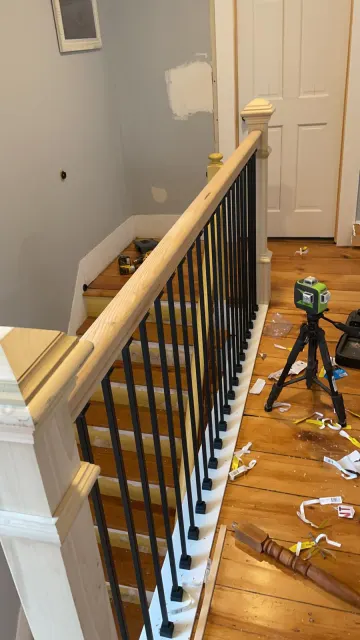 Stair railing installation in progress